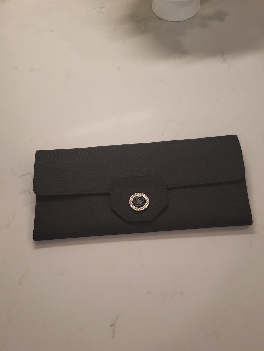 Samsonite Black Travel Pouch with Silver Logo Button